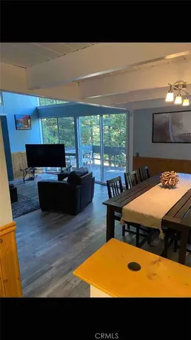 a view of a swimming pool with seating space