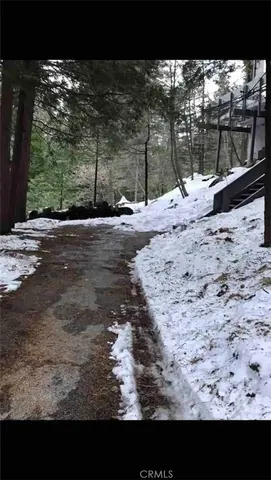 a view of a backyard of a house