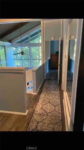 a view of a living room and a fireplace