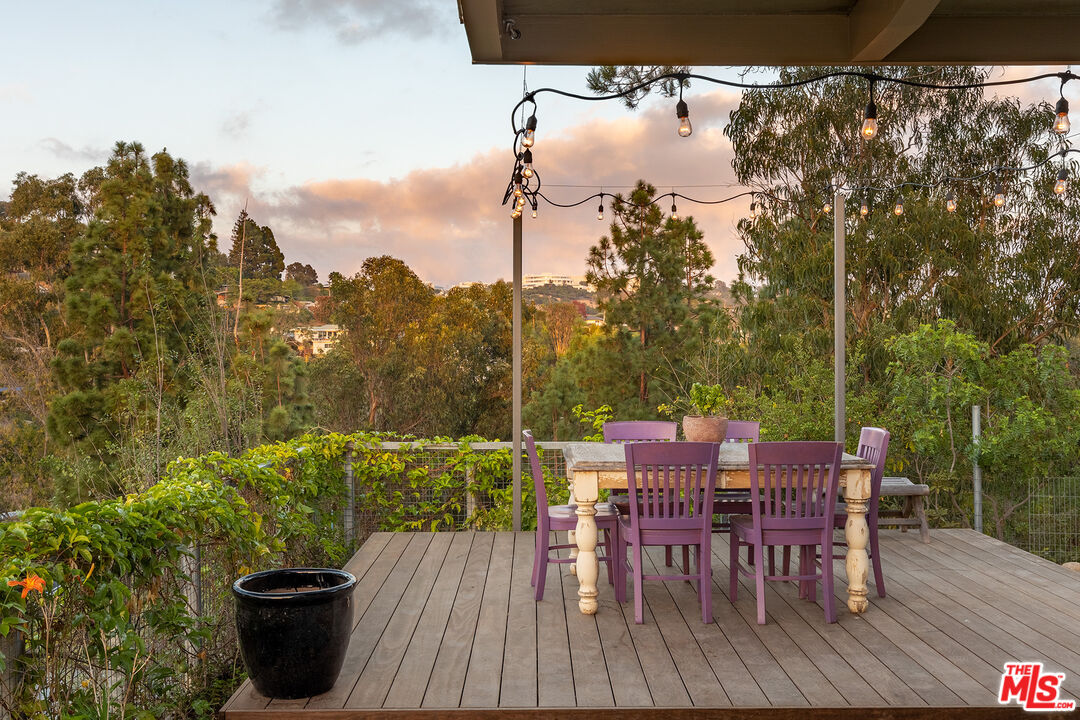 721 Rochedale Way Los Angeles, CA 90049 - Photo 20 of 25 a view of a terrace with furniture