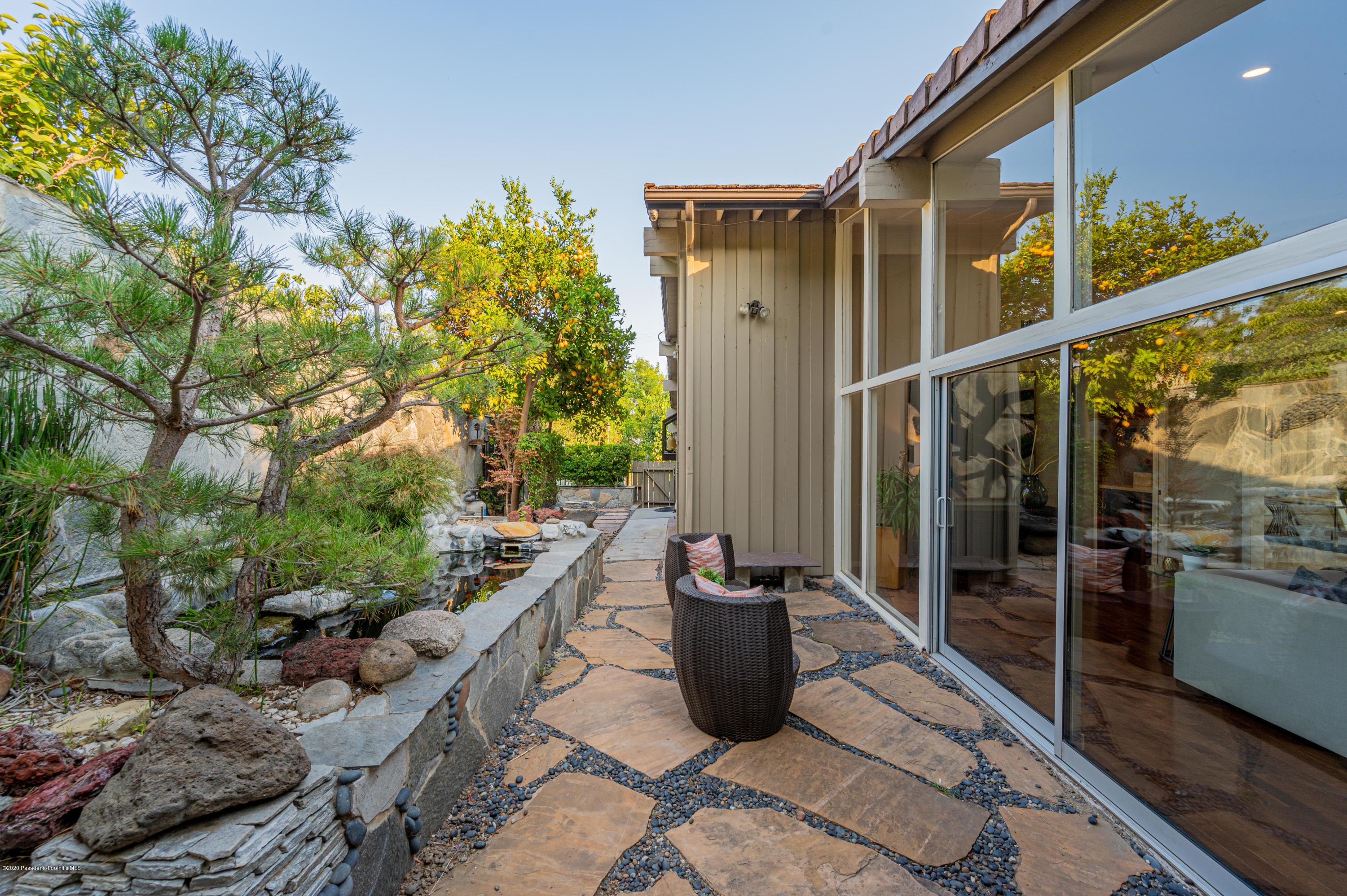 1225 Mesa Road San Marino, CA 91108 - Photo 14 of 48 a view of a balcony with chair and table