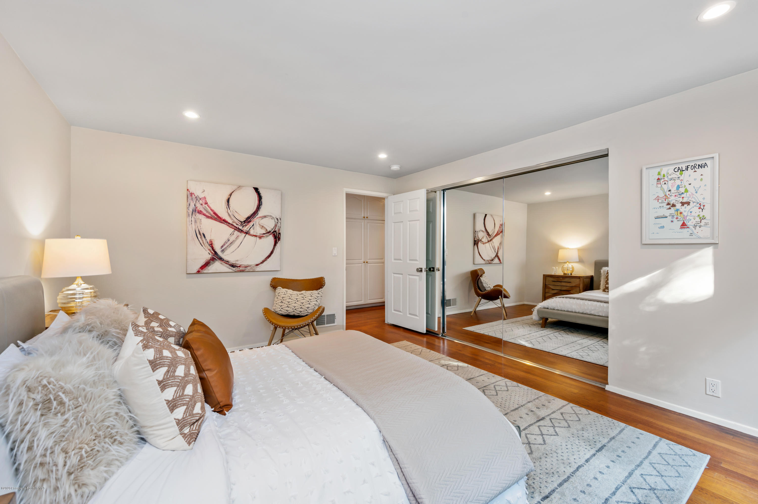 1225 Mesa Road San Marino, CA 91108 - Photo 21 of 48 a bedroom with a bed and lamp