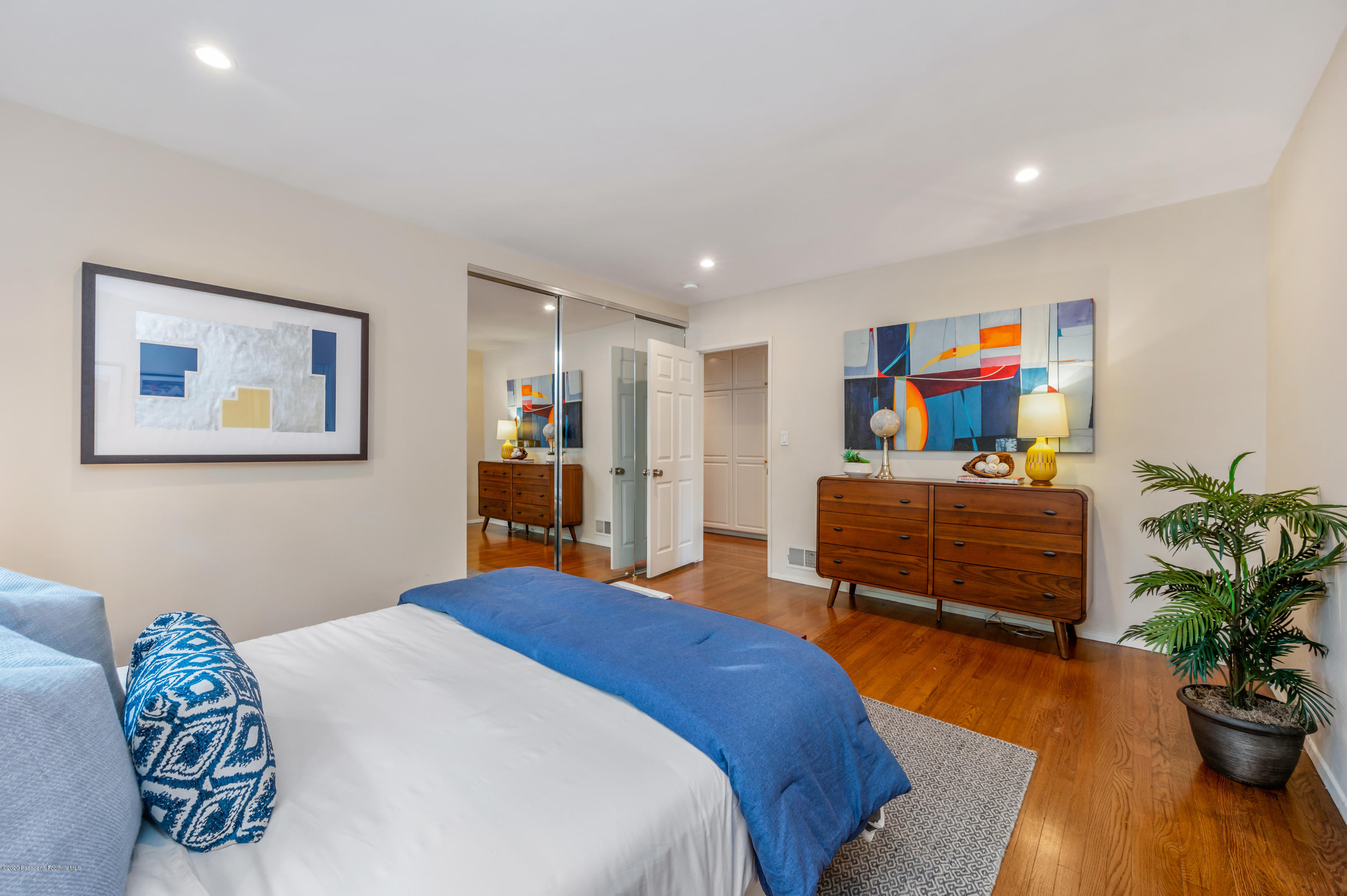 1225 Mesa Road San Marino, CA 91108 - Photo 24 of 48 a bed room with a bed and a couch