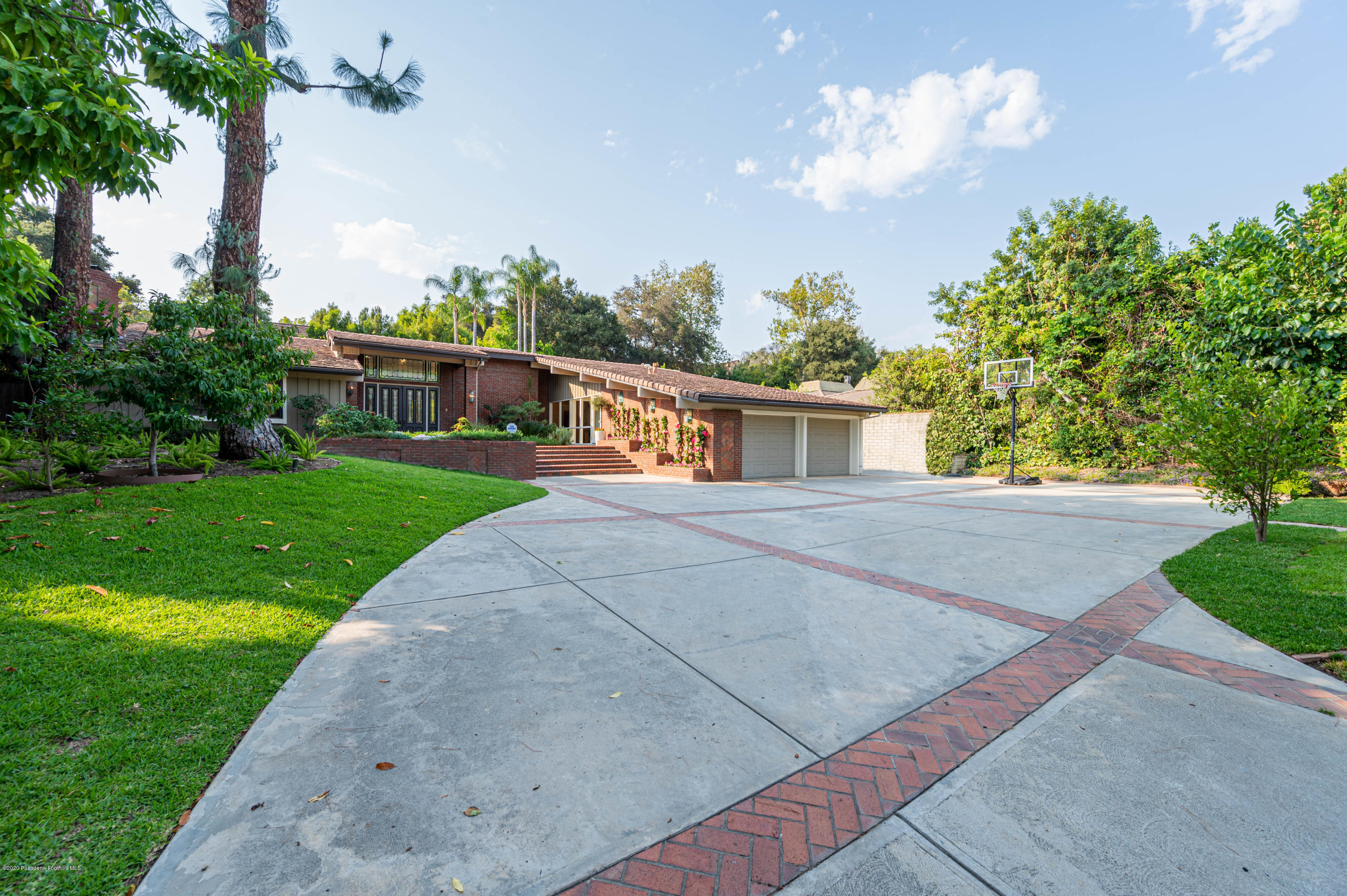 1225 Mesa Road San Marino, CA 91108 - Photo 4 of 48 a view of a house with a yard