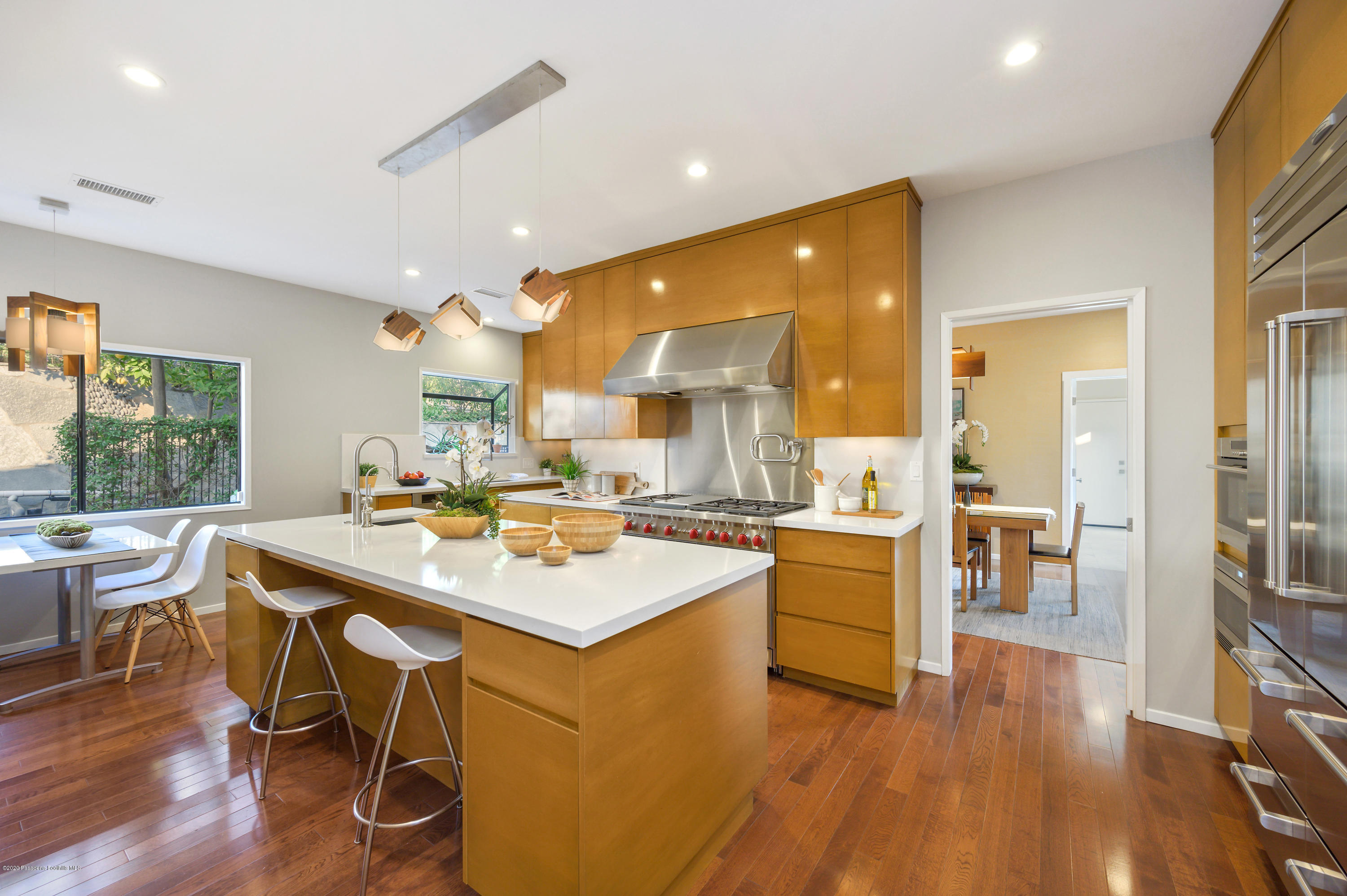1225 Mesa Road San Marino, CA 91108 - Photo 34 of 48 a kitchen with a table and chairs in it