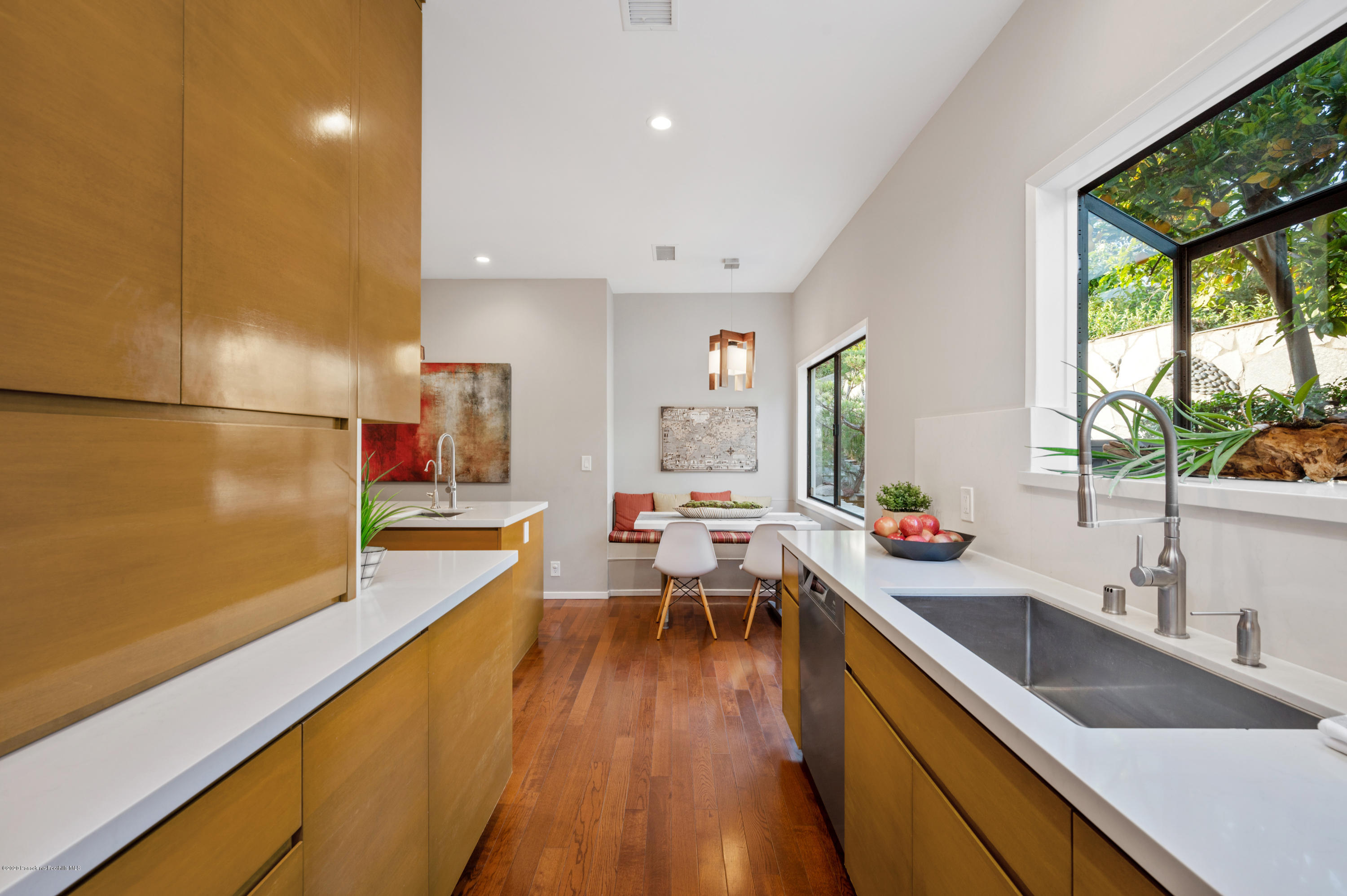1225 Mesa Road San Marino, CA 91108 - Photo 37 of 48 a very nice looking kitchen with a large window wooden floor and stainless steel appliances