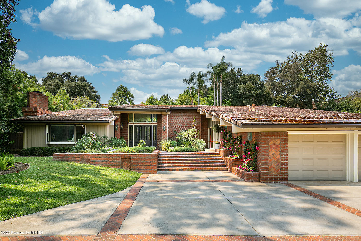 1225 Mesa Road San Marino, CA 91108 - Photo 5 of 48 front view of a house with a yard
