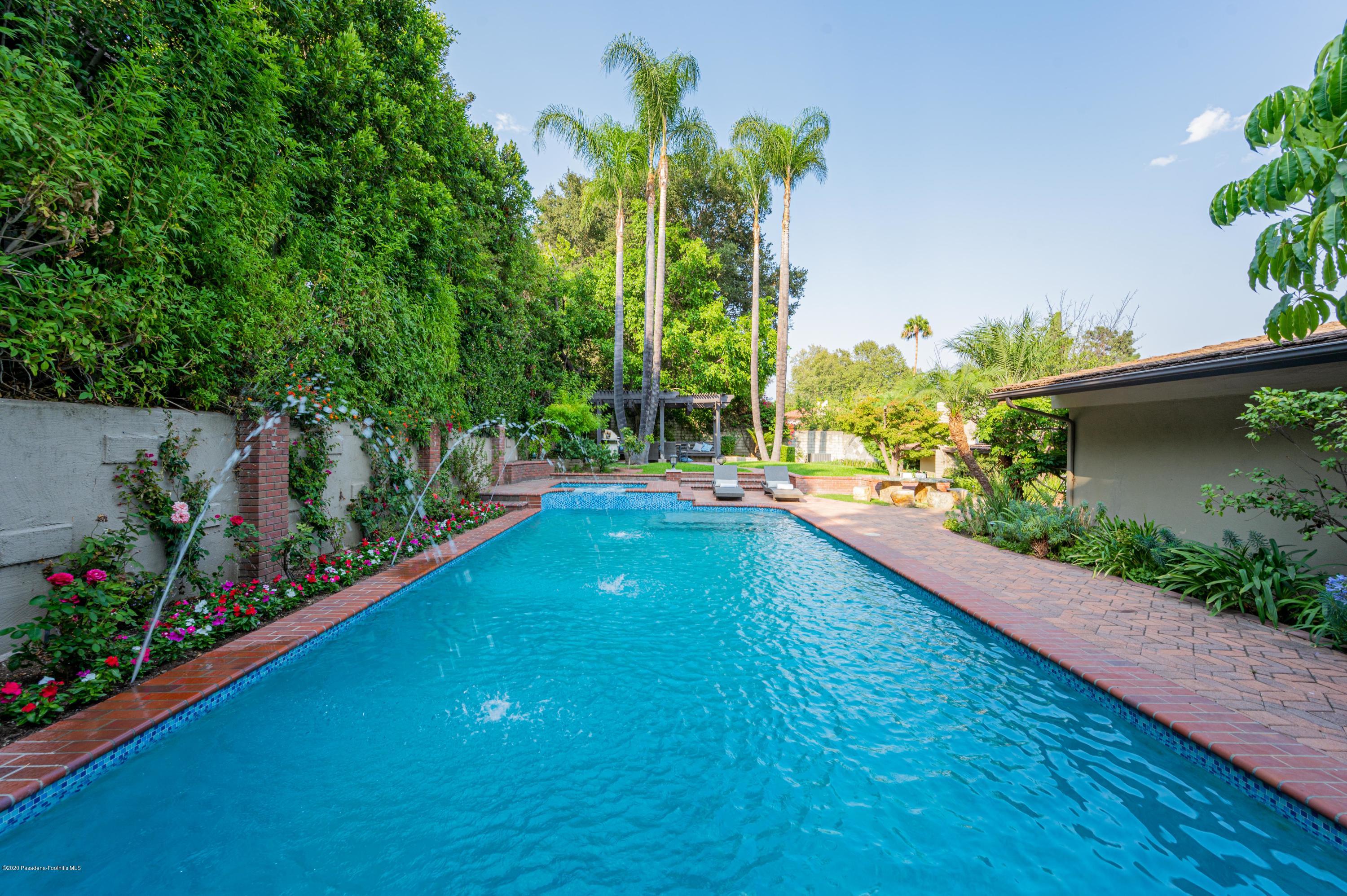 1225 Mesa Road San Marino, CA 91108 - Photo 41 of 48 a view of a garden with a flower pot