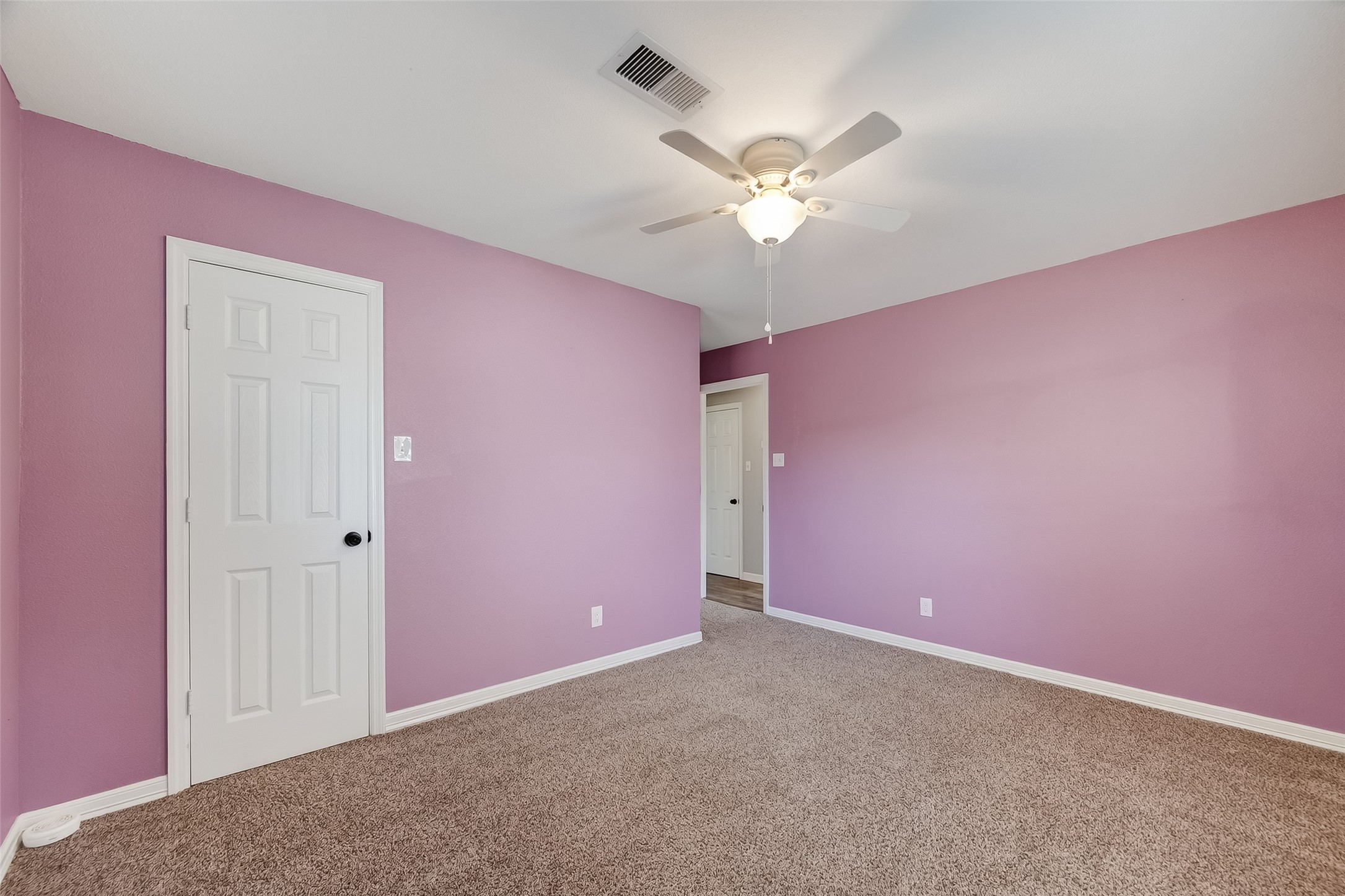 12430 Eiker Road Pearland, TX 77581 - Photo 23 of 41 a view of an empty room with a fan