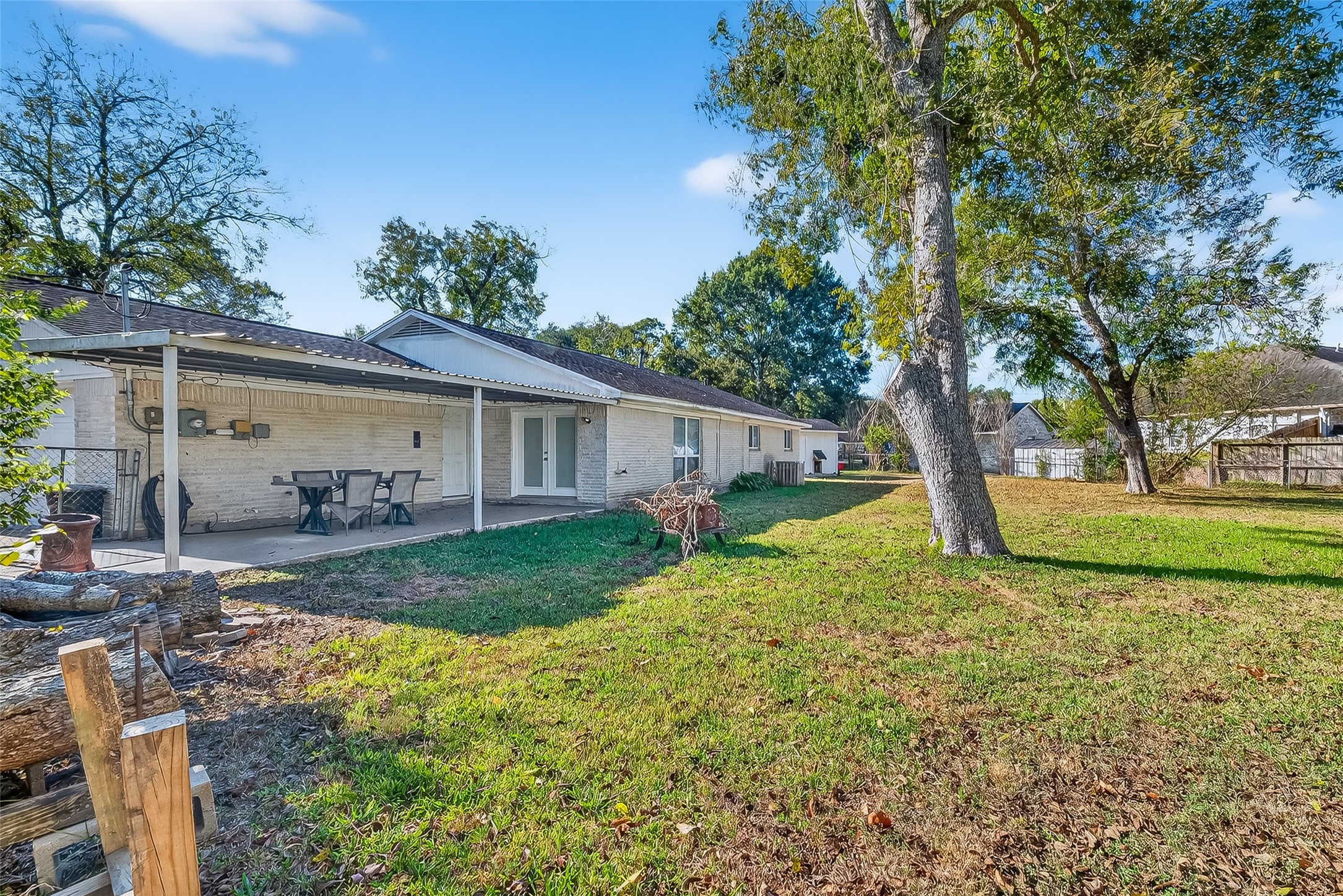 12430 Eiker Road Pearland, TX 77581 - Photo 27 of 41 a view of a house with backyard and a tree