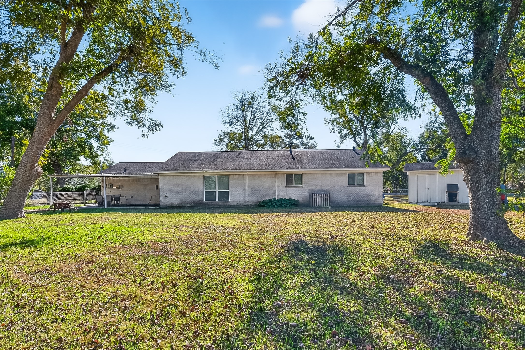 12430 Eiker Road Pearland, TX 77581 - Photo 32 of 41 a front view of house with yard and trees