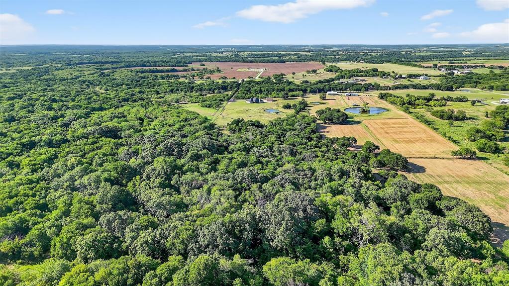 2340 Wright Road Sherman, TX 75092 - Photo 33 of 40 an aerial view of residential houses with outdoor space and trees
