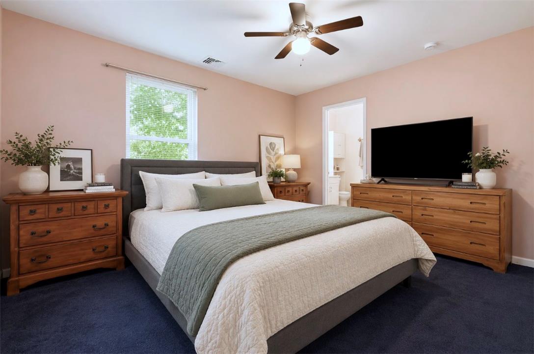 128 Chestnut Street Dingmans Ferry, PA 18328 - Photo 17 of 43 Relax in this tranquil bedroom, offering plush flooring and a convenient attached bath.