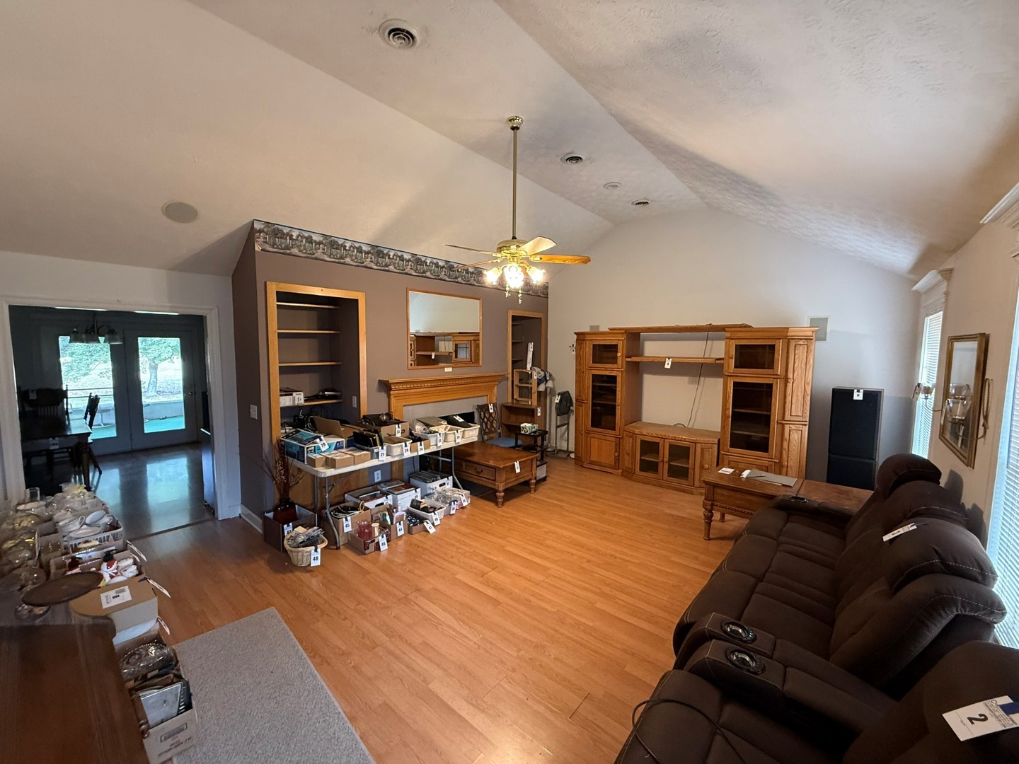 4197 Betty Ford Road Murfreesboro, TN 37130 - Photo 13 of 27 a living room with furniture a fireplace and a chandelier