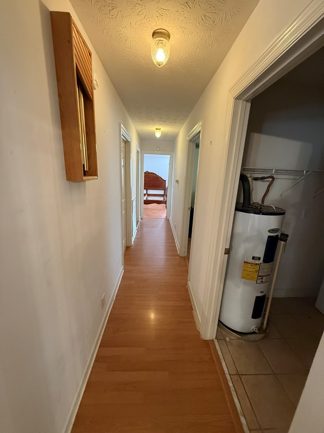 4197 Betty Ford Road Murfreesboro, TN 37130 - Photo 16 of 27 a view of a hallway with wooden floor and stairs