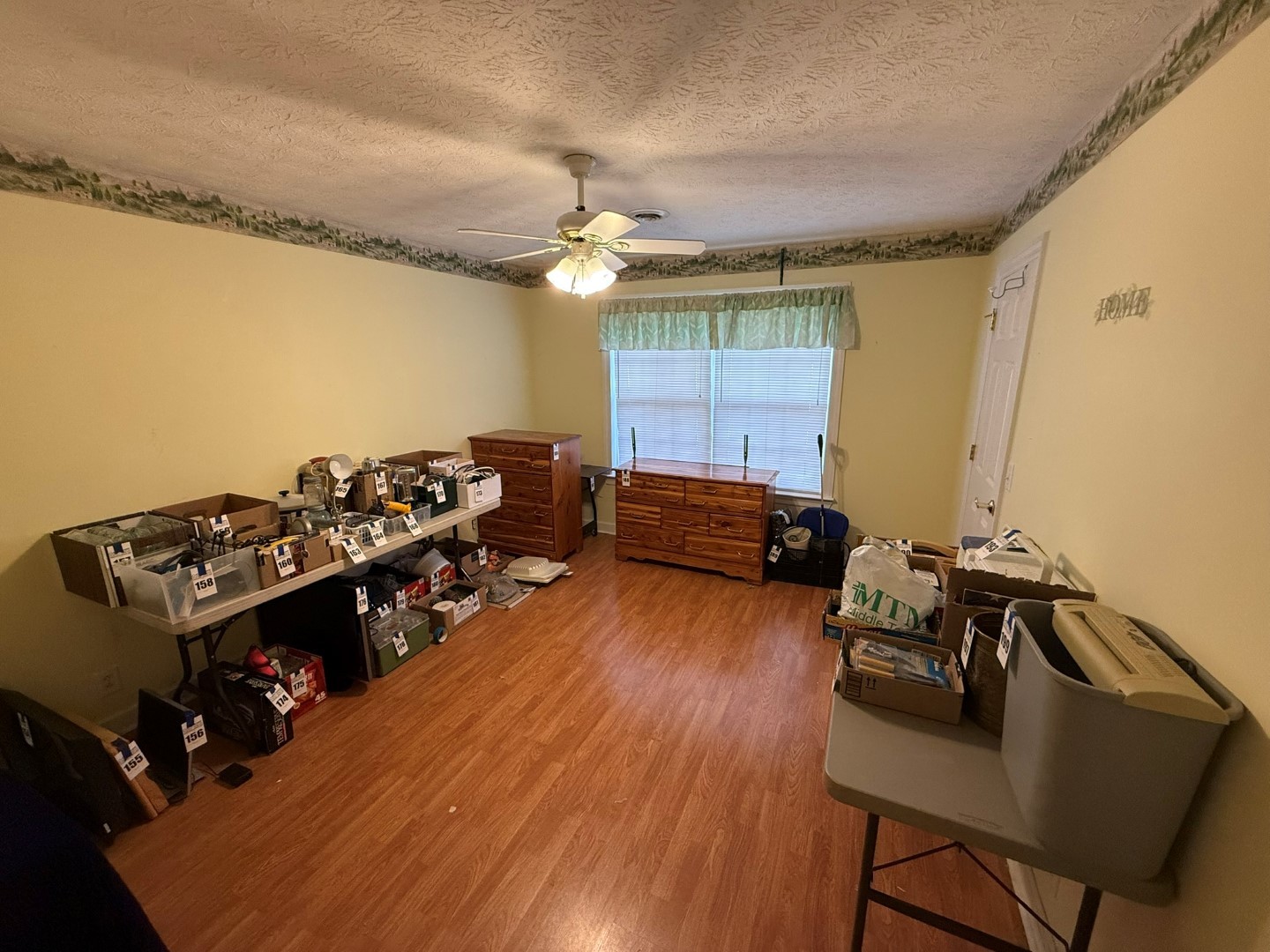 4197 Betty Ford Road Murfreesboro, TN 37130 - Photo 18 of 27 a living room with furniture and a wooden floor