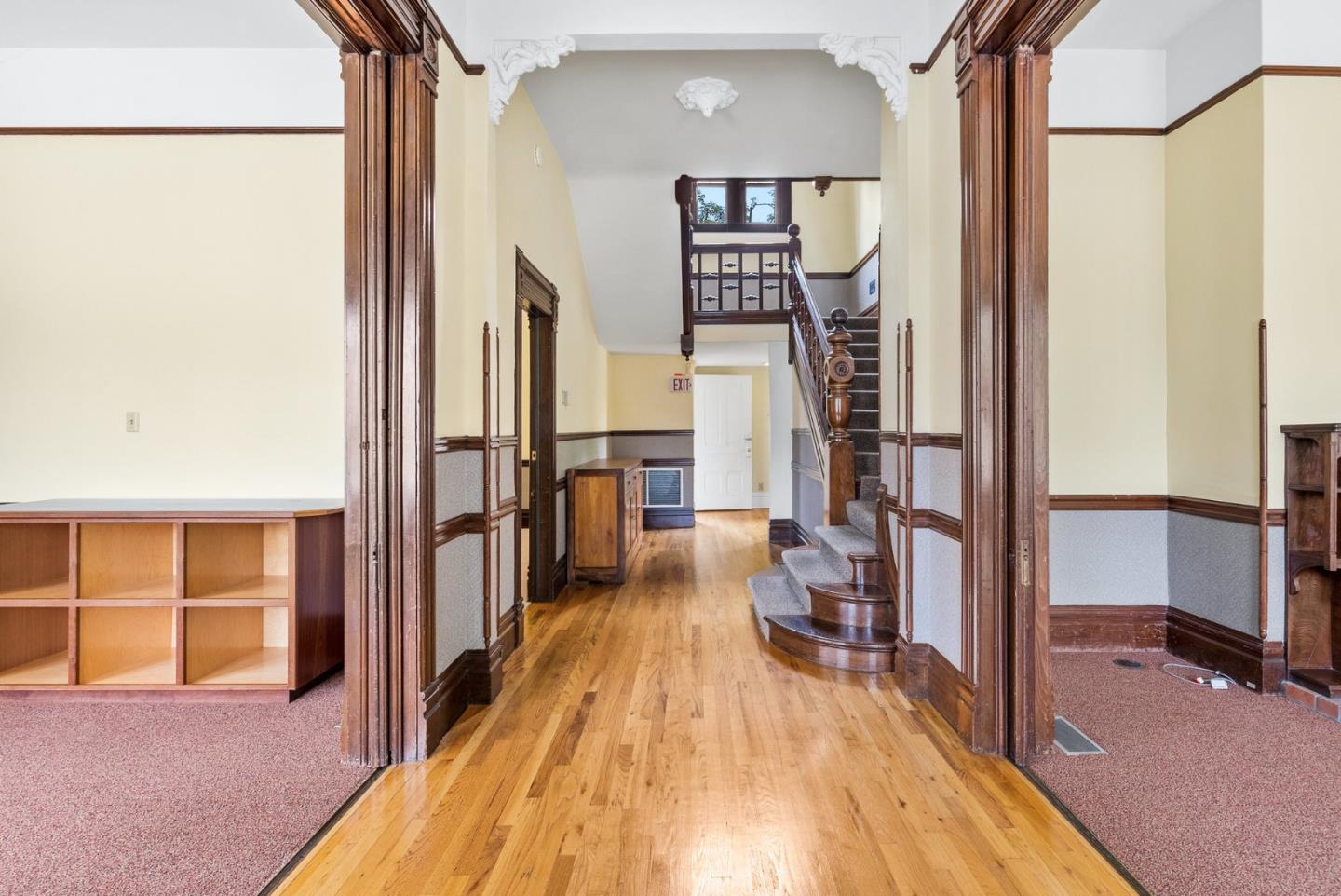 603 Mission Street Santa Cruz, CA 95060 - Photo 20 of 77 a view of a living room with furniture and floor to ceiling window