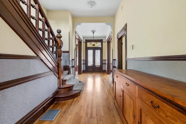 a kitchen with stainless steel appliances granite countertop a stove and a microwave oven