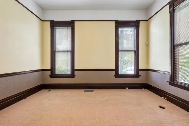 a view of a workspace with furniture