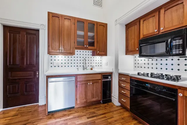 a bathroom with a sink and a shower curtain
