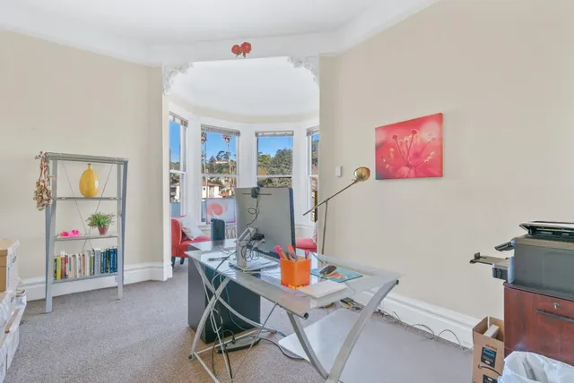 a white refrigerator freezer sitting inside of a kitchen