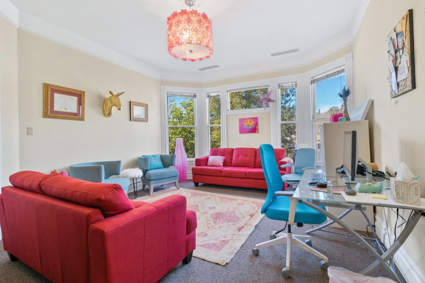 603 Mission Street Santa Cruz, CA 95060 - Photo 35 of 77 a living room with furniture a couch and a large window