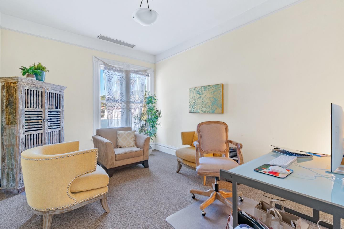 603 Mission Street Santa Cruz, CA 95060 - Photo 38 of 77 a living room with furniture and a wooden floor