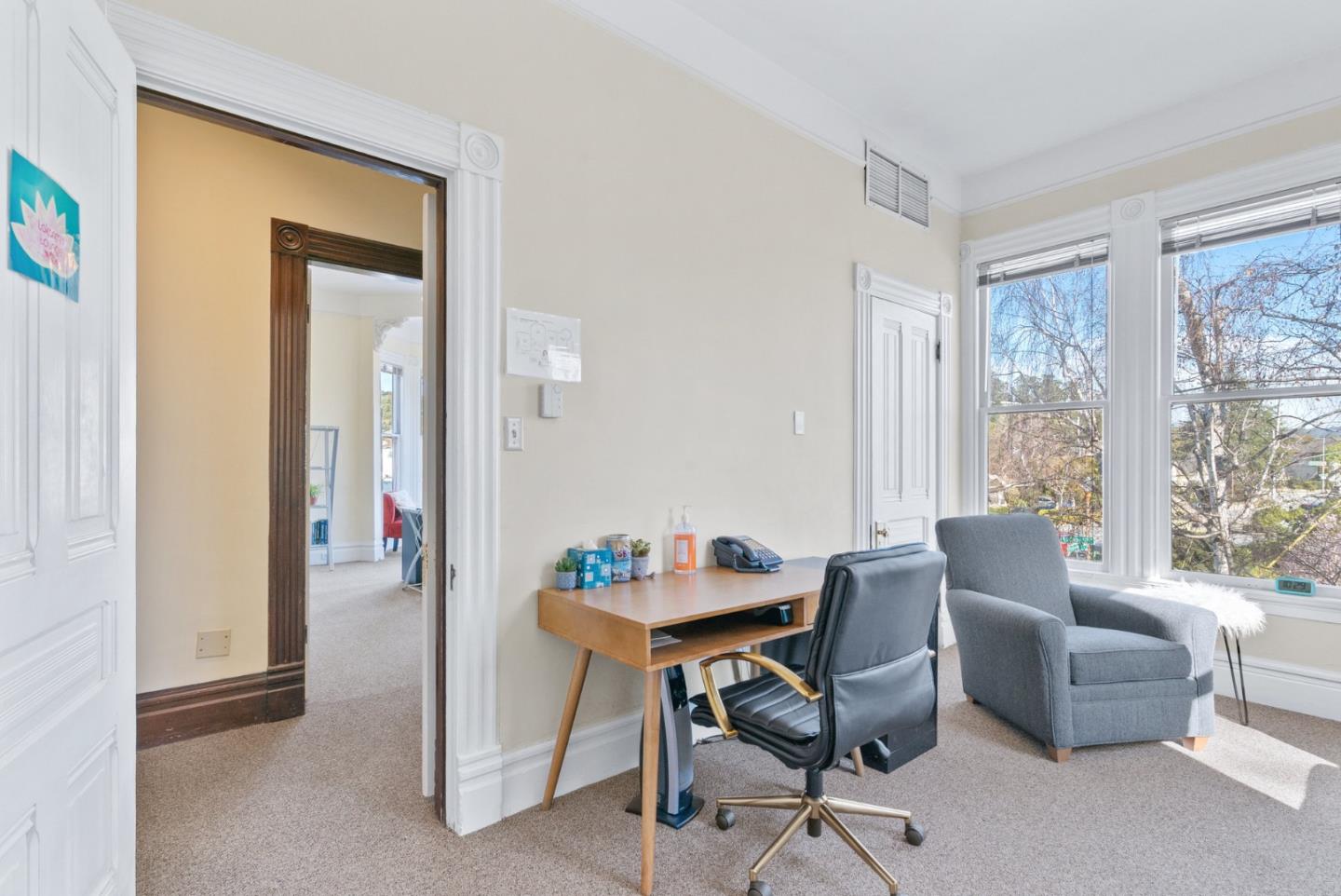 603 Mission Street Santa Cruz, CA 95060 - Photo 40 of 77 a dining room with furniture and a window