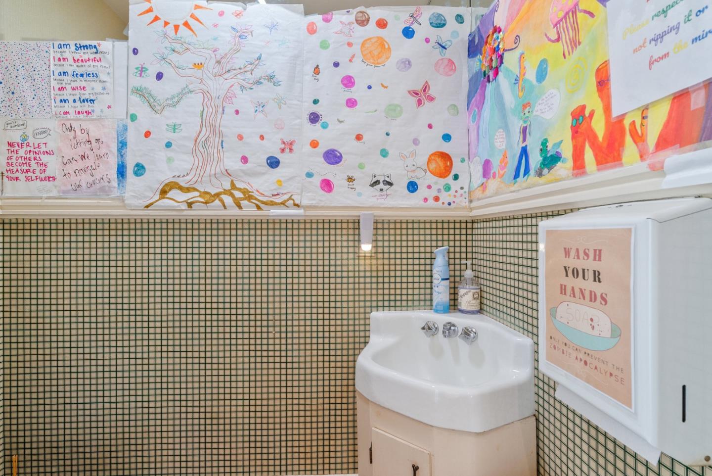 603 Mission Street Santa Cruz, CA 95060 - Photo 41 of 77 a bathroom with a sink and a shower curtain