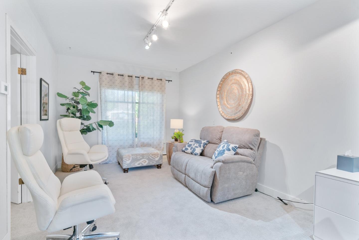 603 Mission Street Santa Cruz, CA 95060 - Photo 56 of 77 a living room with furniture and a window