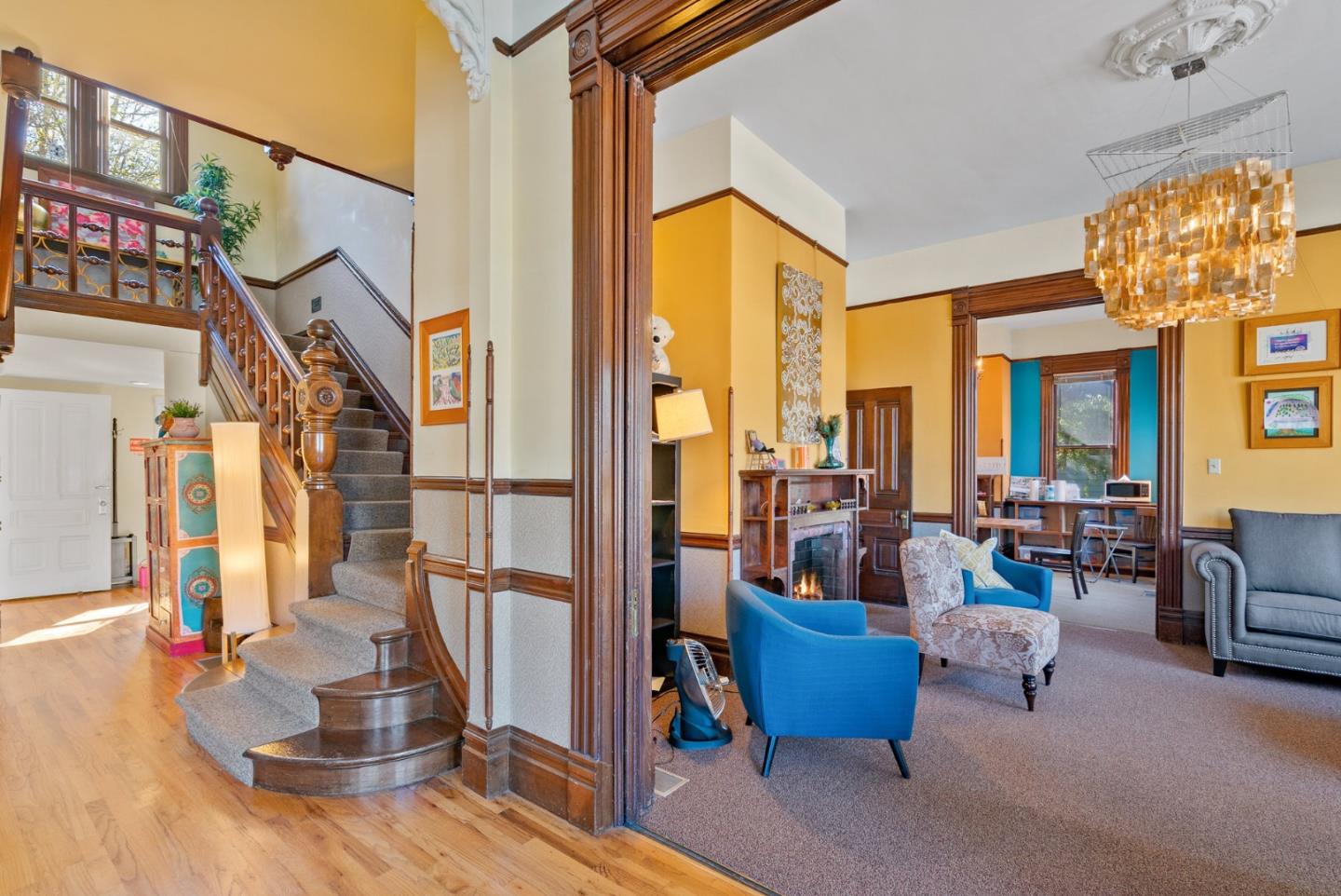 603 Mission Street Santa Cruz, CA 95060 - Photo 10 of 77 a living room with furniture and a floor to ceiling windows