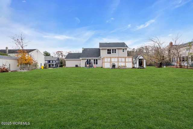 a view of a park with large trees