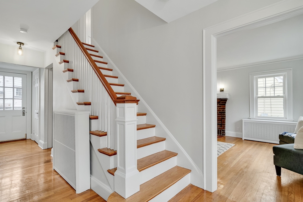 32 Valentine Road Arlington, MA 02476 - Photo 2 of 38 a view of an entryway with wooden floor