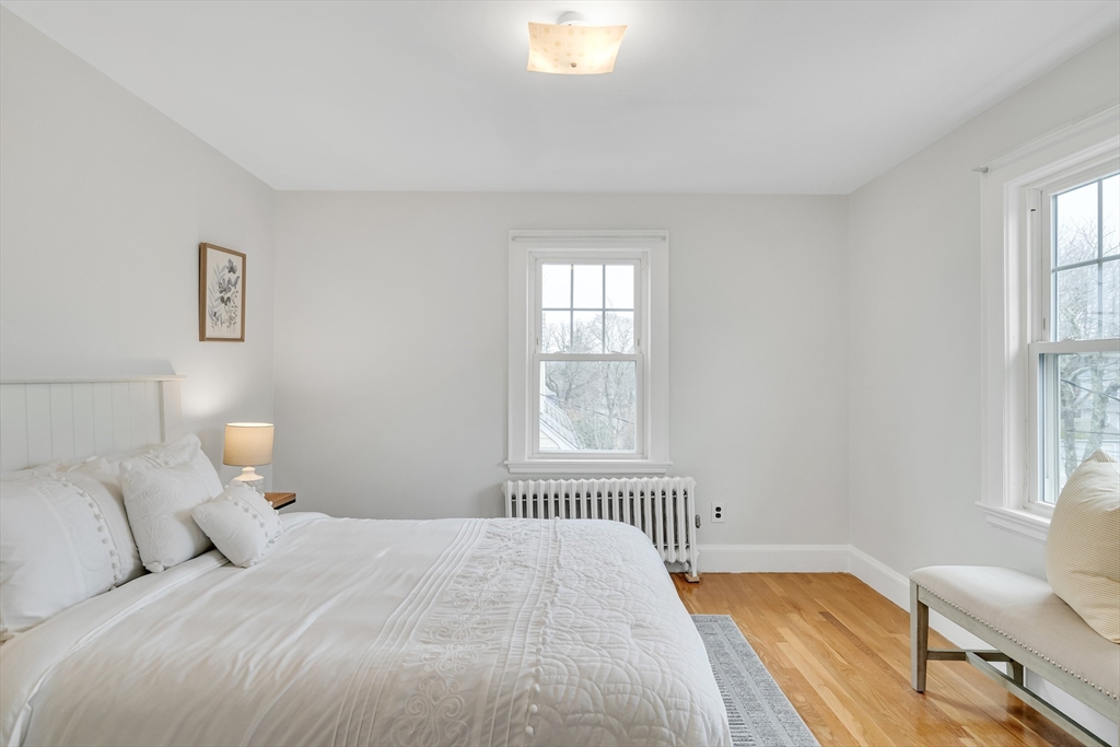 32 Valentine Road Arlington, MA 02476 - Photo 25 of 38 a bedroom with a bed and a window