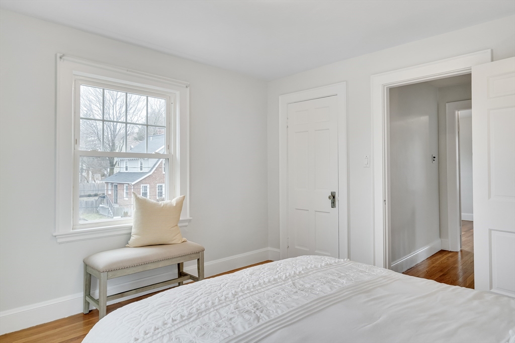 32 Valentine Road Arlington, MA 02476 - Photo 28 of 38 a bedroom with furniture and a window