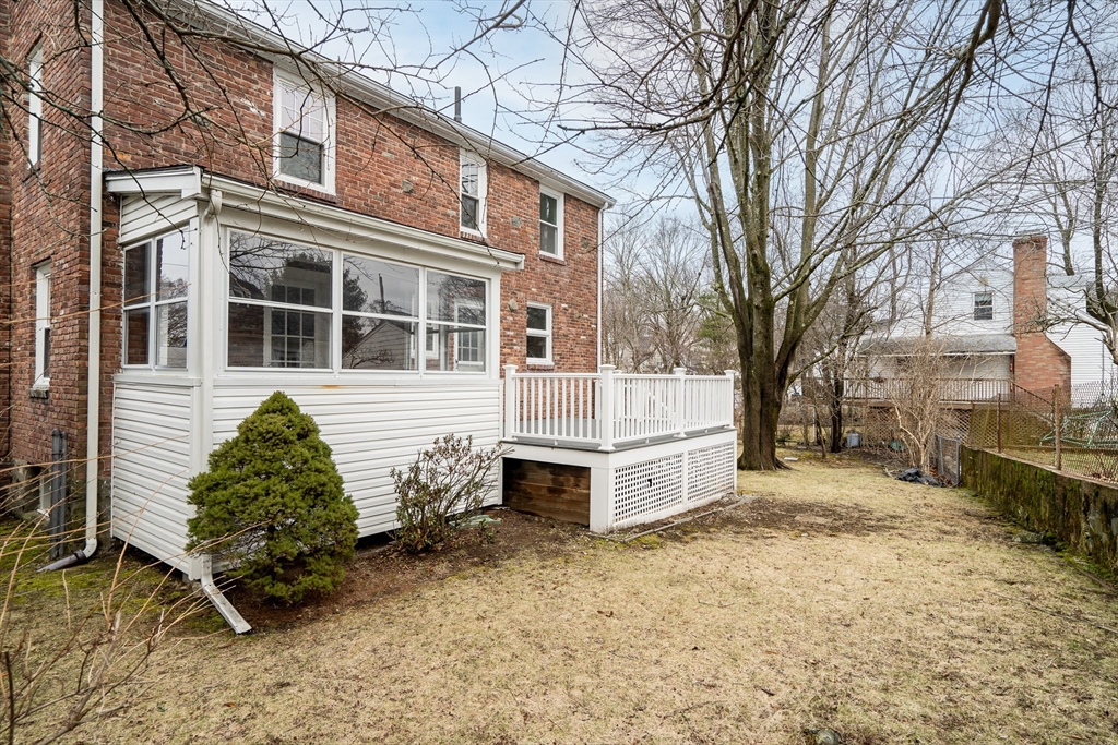 32 Valentine Road Arlington, MA 02476 - Photo 36 of 38 a front view of a house with a yard