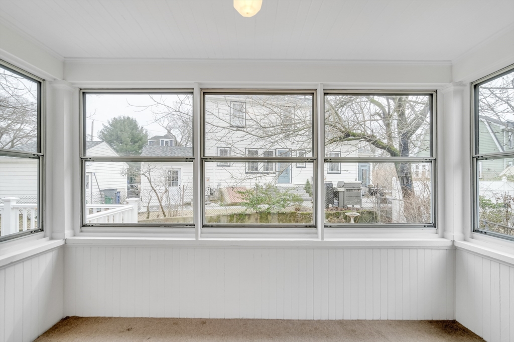 32 Valentine Road Arlington, MA 02476 - Photo 9 of 38 a living room with a large window