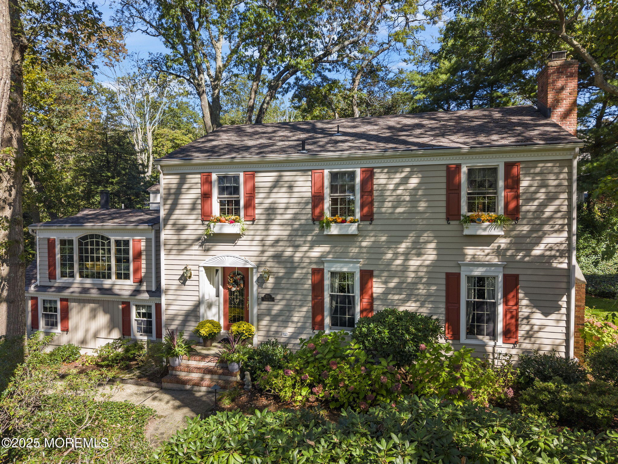 front view of a house with a small yard