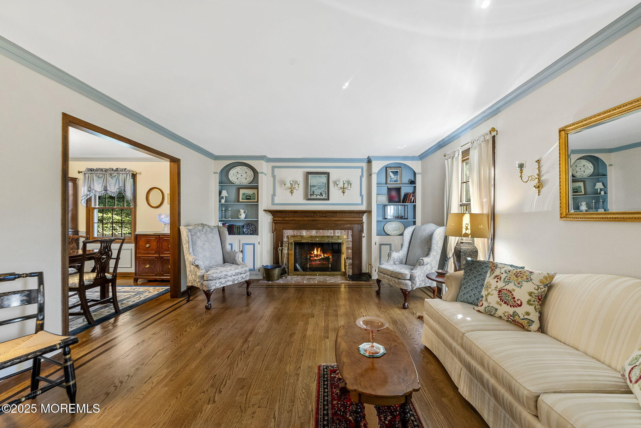 700 Rankin Road Brielle, NJ 08730 - Photo 11 of 59 a living room with furniture and a fireplace