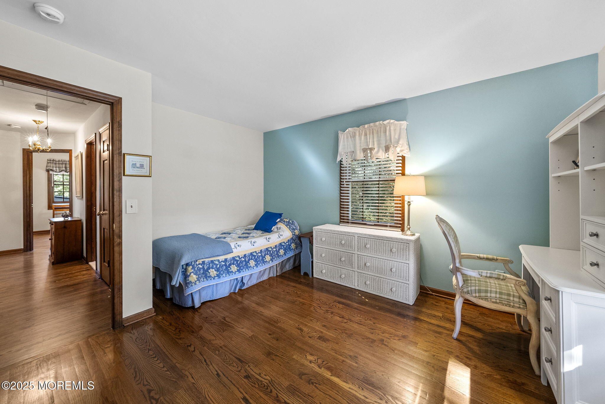 700 Rankin Road Brielle, NJ 08730 - Photo 29 of 59 a bedroom with a bed and a chair