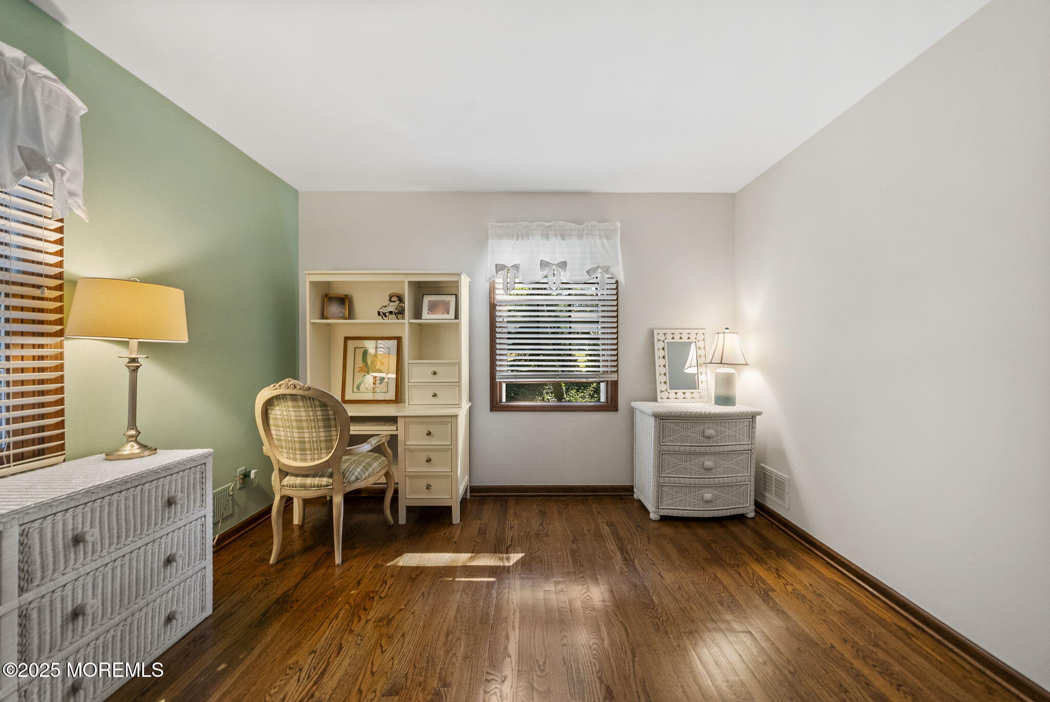 700 Rankin Road Brielle, NJ 08730 - Photo 32 of 59 a room with furniture and a wooden floor