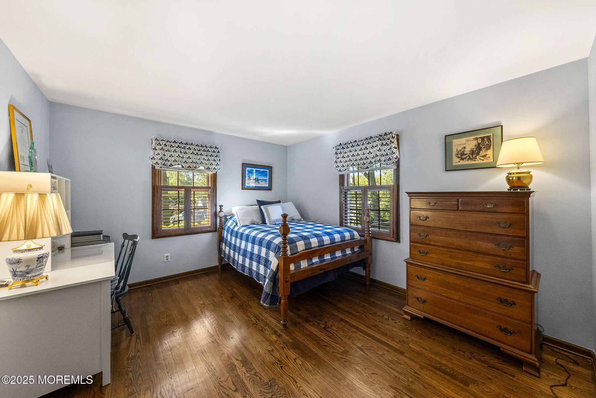 700 Rankin Road Brielle, NJ 08730 - Photo 33 of 59 a bedroom with a bed and wooden floor