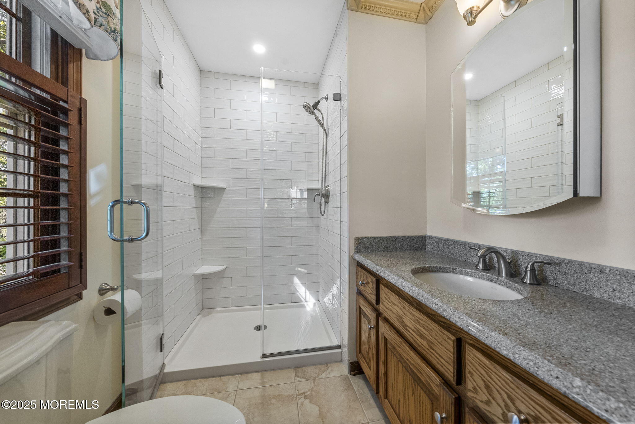 700 Rankin Road Brielle, NJ 08730 - Photo 36 of 59 a bathroom with a granite countertop sink a toilet and shower