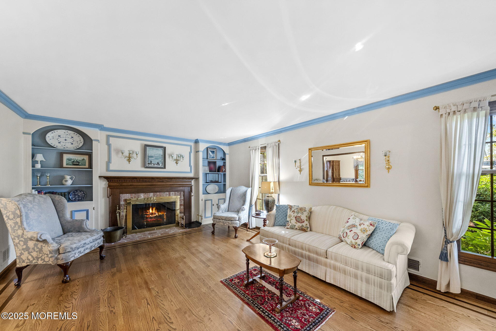 700 Rankin Road Brielle, NJ 08730 - Photo 10 of 59 a living room with furniture and a fireplace
