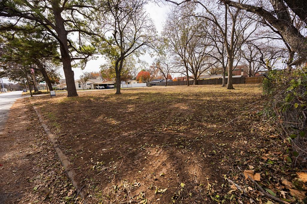 216 North Scott Street Burleson, TX 76028 - Photo 2 of 5 a view of outdoor space with trees