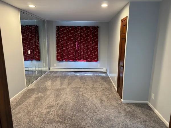 an empty room with window