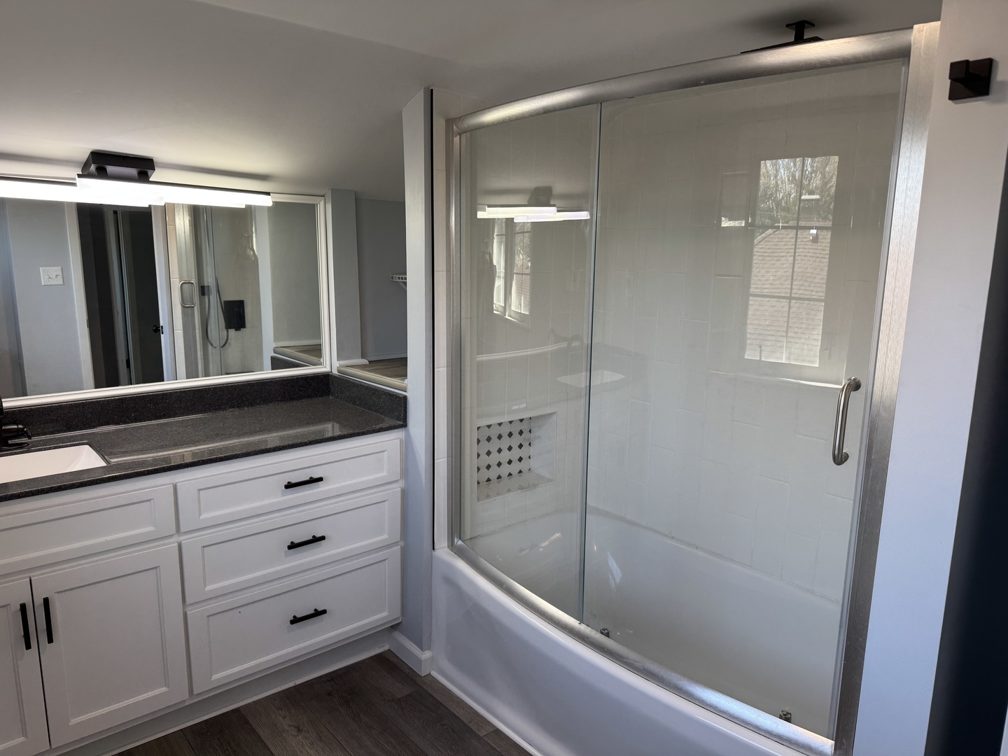 403 Mitchell Street Benton, IL 62812 - Photo 32 of 44 a bathroom with a bathtub and a shower