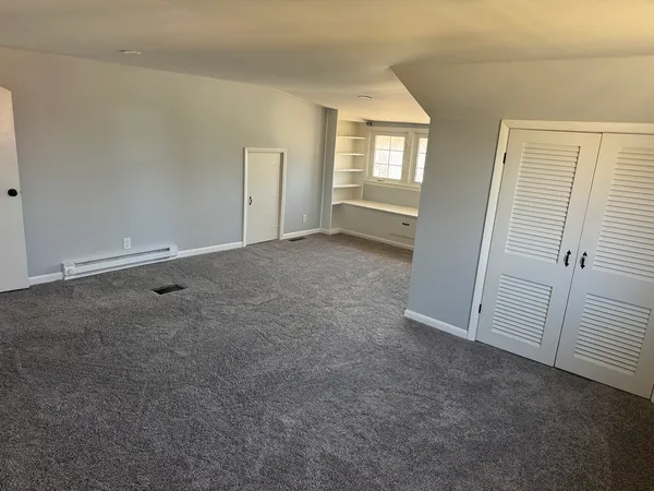 an empty room with windows