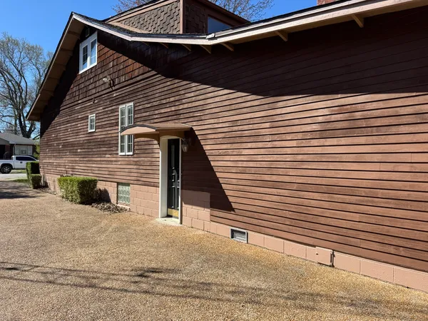 a view of a house with a garage