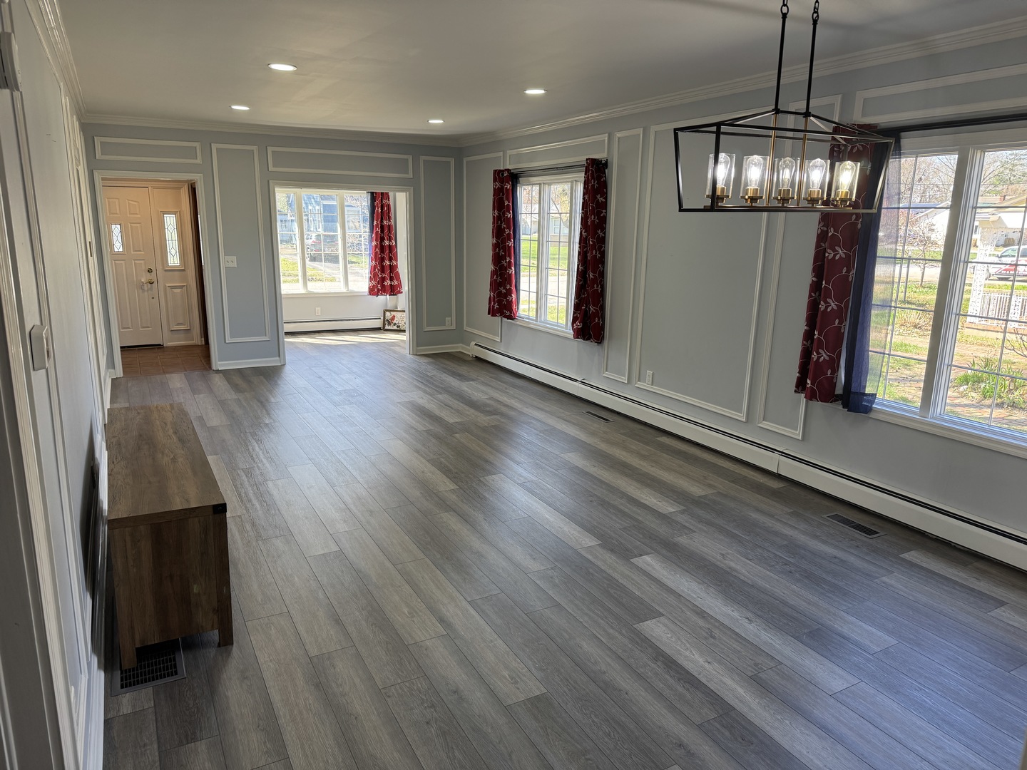 403 Mitchell Street Benton, IL 62812 - Photo 9 of 44 an empty room with wooden floor and windows